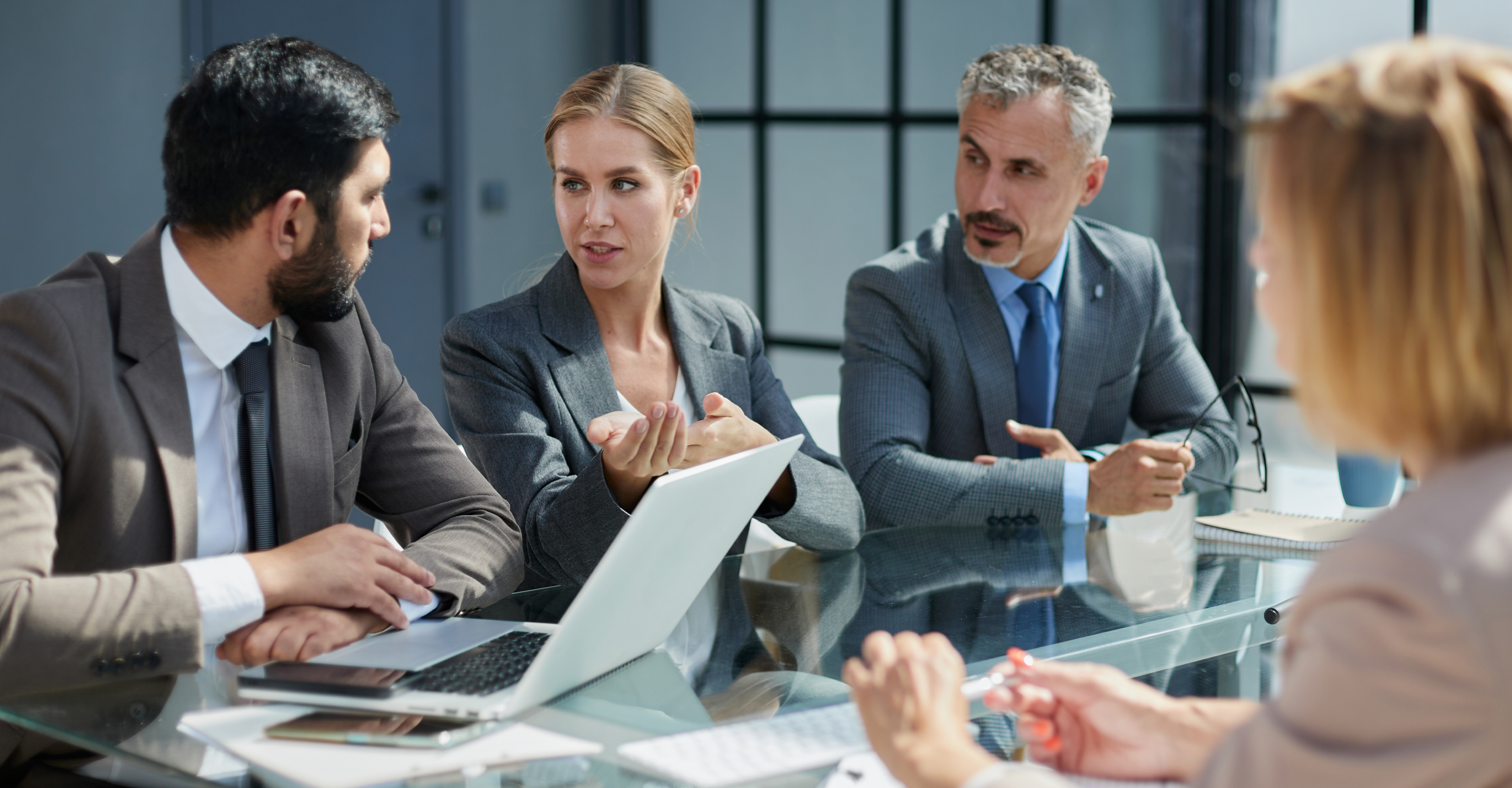 group of professionals at conference table, meeting, board of directors, family office, family discussion